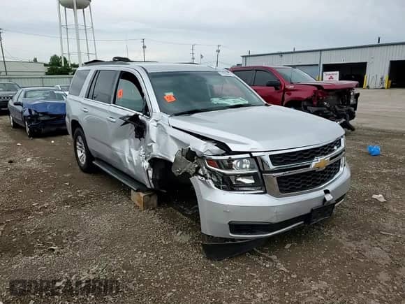 2018 Chevrolet Tahoe LT z VIN 1GNSCBKC6JR131196, wystawiony jako Copart lot #61868435 z przebiegiem Nie podano mil oraz Szkoda całkowita • Salvage title. Historia ofert i sprzedaży dostępna na DreamBid. Obrazek 14.