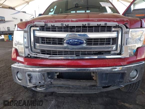 2013 Ford F-150 Lariat with VIN 1FTFW1ET5DKE88227, listed as a IAAI auction lot 43330750 with 140,077 mi miles and . Bid and sale history available at DreamBid. Image 6.