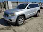 2012 Jeep Grand Cherokee Limited z VIN 1C4RJEBG2CC317633, wystawiony jako Copart lot #81336605 z przebiegiem 166 863 mil mil oraz Szkoda całkowita • Salvage title. Historia ofert i sprzedaży dostępna na DreamBid. Obrazek 1.
