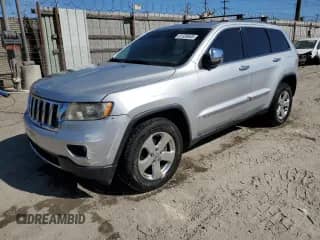 2012 Jeep Grand Cherokee Limited z VIN 1C4RJEBG2CC317633, wystawiony jako Copart lot #81336605 z przebiegiem 166 863 mil mil oraz Szkoda całkowita • Salvage title. Historia ofert i sprzedaży dostępna na DreamBid. Obrazek 1.