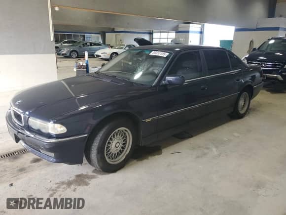 2001 BMW 7 Series 740iL with VIN WBAGH83461DP21421, listed as a Copart auction lot 84357185 with 233,065 mi miles and Clean title. Bid and sale history available at DreamBid. Image 1.