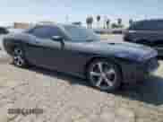 2014 Dodge Challenger R/T Plus with VIN 2C3CDYBT1EH294121, listed as a Copart auction lot 60687575 with 121,607 mi miles and Salvage title. Bid and sale history available at DreamBid. Image 4.