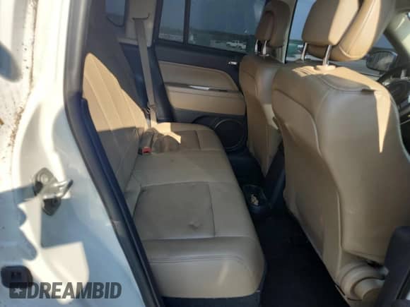 2016 Jeep Compass Latitude with VIN 1C4NJCEA7GD777378, listed as a Copart auction lot 56390385 with 123,186 mi miles and Salvage title. Bid and sale history available at DreamBid. Image 10.