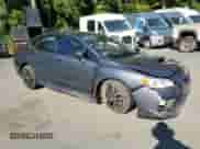 2020 Subaru WRX with VIN JF1VA1A61L9810559, listed as a Copart auction lot 71215395 with 84,597 mi miles and Salvage title. Bid and sale history available at DreamBid. Image 4.