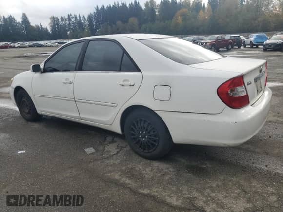2004 Toyota Camry LE z VIN JTDBE32K340268167, wystawiony jako Copart lot #90885535 z przebiegiem 159 808 mil mil oraz Czysty tytuł • Clean title. Historia ofert i sprzedaży dostępna na DreamBid. Obrazek 2.