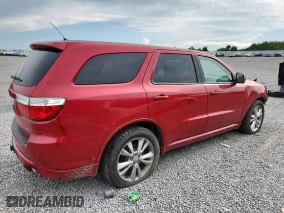 2012 Dodge Durango R/T with VIN 1C4SDJCT3CC116577, listed as a Copart auction lot 65397015 with 157,732 mi miles and Salvage title. Bid and sale history available at DreamBid. Image 3.