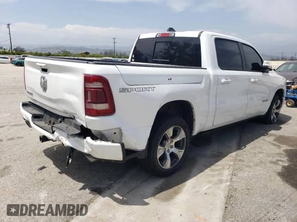 2023 Ram 1500 Laramie z VIN 1C6RREJTXPN565573, wystawiony jako Copart lot #57505115 z przebiegiem 29 298 mil mil oraz Szkoda całkowita • Salvage title. Historia ofert i sprzedaży dostępna na DreamBid. Obrazek 3.