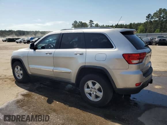 2011 Jeep Grand Cherokee 70th Anniversary z VIN 1J4RR4GG0BC508200, wystawiony jako Copart lot #80286225 z przebiegiem 219 332 mil mil oraz Szkoda całkowita • Salvage title. Historia ofert i sprzedaży dostępna na DreamBid. Obrazek 2.