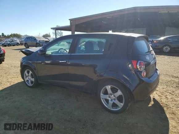 2012 Chevrolet Sonic LTZ with VIN 1G1JE6SH5C4195594, listed as a Copart auction lot 88336435 with 105,112 mi miles and Salvage title. Bid and sale history available at DreamBid. Image 2.