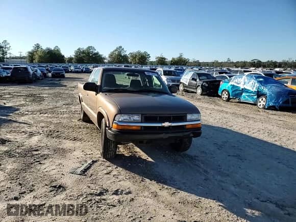 2003 Chevrolet S-10 LS с VIN 1GCCS19H338135453, выставлен на аукционе Copart как лот 86816654 с пробегом Не указан миль и Списание • Salvage title. История ставок и продаж доступна на DreamBid. Изображение 10.
