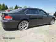 2002 BMW 7 Series 745Li with VIN WBAGN63482DR02390, listed as a Copart auction lot 64513685 with 135,239 mi miles and Salvage title. Bid and sale history available at DreamBid. Image 3.