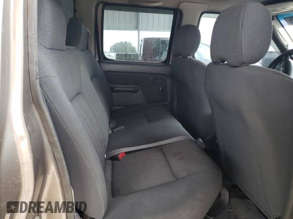 2003 Nissan Frontier XE with VIN 1N6ED29YX3C426339, listed as a Copart auction lot 66861735 with 243,002 mi miles and Salvage title. Bid and sale history available at DreamBid. Image 10.