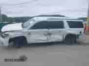 2015 Chevrolet Suburban LT with VIN 1GNSKJKC5FR591115, listed as a IAAI auction lot 43445461 with 126,794 mi miles and . Bid and sale history available at DreamBid. Image 6.