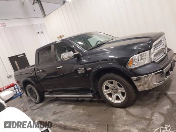 2015 Ram 1500 Laramie Longhorn с VIN 1C6RR7PT4FS637032, выставлен на аукционе IAAI как лот 43418379 с пробегом 134 247 миль миль и . История ставок и продаж доступна на DreamBid. Изображение 14.