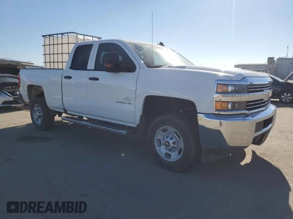 2016 Chevrolet Silverado 2500HD Work Truck with VIN 1GC2KUE86GZ184973, listed as a Copart auction lot 41460785 with 136,516 mi miles and Salvage title. Bid and sale history available at DreamBid. Image 4.