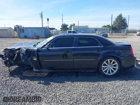 2006 Chrysler 300 C SRT-8 with VIN 2C3LA73W36H509656, listed as a IAAI auction lot 41852179 with 92,209 mi miles and . Bid and sale history available at DreamBid. Image 15.