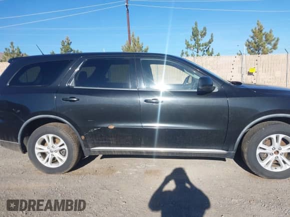 2012 Dodge Durango SXT with VIN 1C4RDJAG3CC112646, listed as a IAAI auction lot 43528808 with 227,796 mi miles and . Bid and sale history available at DreamBid. Image 13.