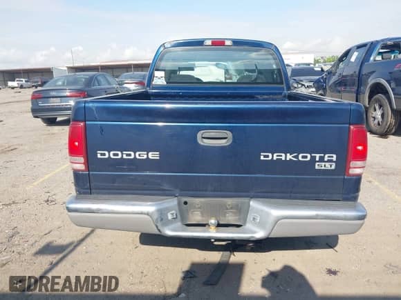 2004 Dodge Dakota SLT with VIN 1D7HL48K74S667977, listed as a IAAI auction lot 42051532 with 92,339 mi miles and . Bid and sale history available at DreamBid. Image 16.