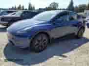 2024 Tesla Model Y Long Range with VIN 7SAYGDEEXRF129763, listed as a Copart auction lot 70710374 with 333 mi miles and Salvage title. Bid and sale history available at DreamBid. Image 1.