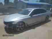 2016 BMW 7 Series 750i xDrive с VIN WBA7F2C59GG417311, выставлен на аукционе Copart как лот 61777655 с пробегом 103 374 миль миль и Списание • Salvage title. История ставок и продаж доступна на DreamBid. Изображение 1.