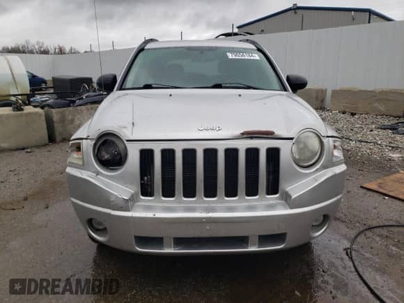 2010 Jeep Compass Latitude с VIN 1J4NF1FB1AD646011, выставлен на аукционе Copart как лот 79056184 с пробегом 178 737 миль миль и На запчасти • Non repairable. История ставок и продаж доступна на DreamBid. Изображение 5.