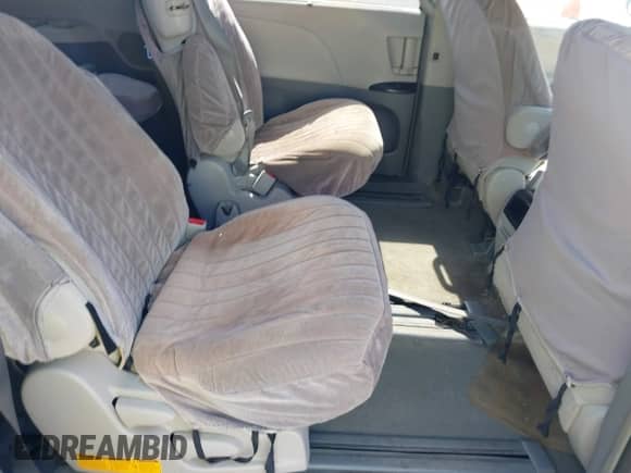 2013 Toyota Sienna LE AAS with VIN 5TDKK3DC2DS298045, listed as a IAAI auction lot 43312400 with 157,238 mi miles and . Bid and sale history available at DreamBid. Image 8.