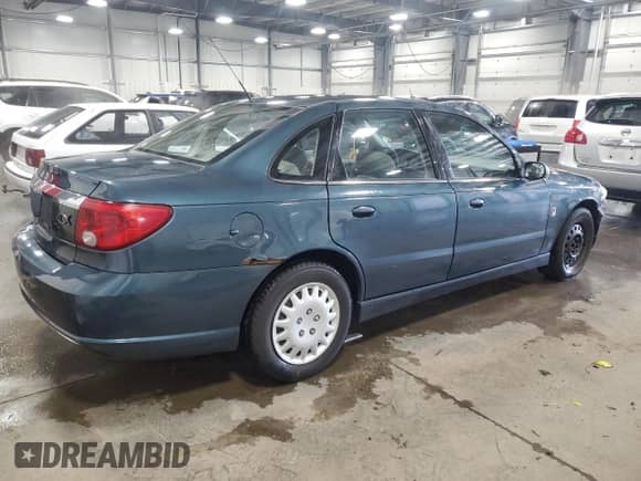 2004 Saturn L L300 1 with VIN 1G8JC54F04Y513306, listed as a Copart auction lot 41419895 with 81,860 mi miles and Salvage title. Bid and sale history available at DreamBid. Image 3.