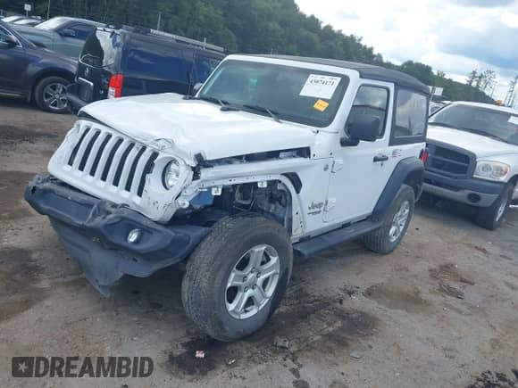 2020 Jeep Wrangler Sport S with VIN 1C4GJXAN3LW121976, listed as a IAAI auction lot 43074171 with 19,927 mi miles and . Bid and sale history available at DreamBid. Image 20.