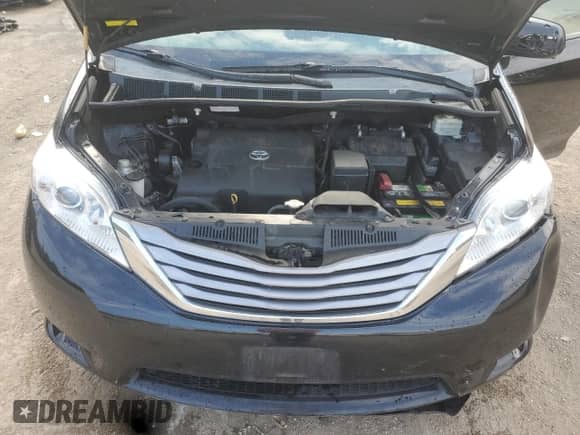 2015 Toyota Sienna XLE with VIN 5TDYK3DC5FS595095, listed as a Copart auction lot 72076705 with 97,540 mi miles and Salvage title. Bid and sale history available at DreamBid. Image 12.
