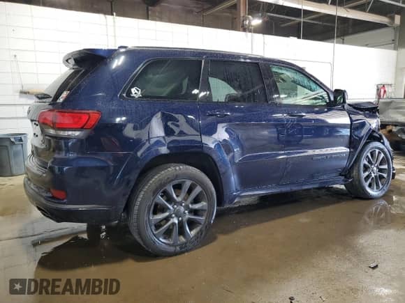 2018 Jeep Grand Cherokee High Altitude with VIN 1C4RJFCT9JC225949, listed as a Copart auction lot 65195915 with 124,472 mi miles and Salvage title. Bid and sale history available at DreamBid. Image 3.