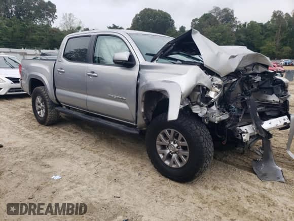 2017 Toyota Tacoma TRD Off Road with VIN 3TMCZ5AN7HM117058, listed as a Copart auction lot 83924325 with Not provided miles and Salvage title. Bid and sale history available at DreamBid. Image 4.