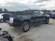 2018 Toyota Tacoma SR5 с VIN 5TFBZ5DN4JX003834, выставлен на аукционе Copart как лот 69634275 с пробегом 297 503 миль миль и На запчасти • Non repairable. История ставок и продаж доступна на DreamBid. Изображение 3.