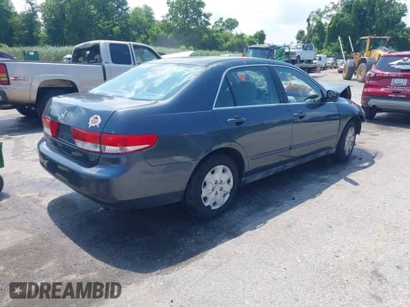 2003 Honda Accord LX with VIN 3HGCM56363G712708, listed as a IAAI auction lot 42699956 with 186,060 mi miles and . Bid and sale history available at DreamBid. Image 4.