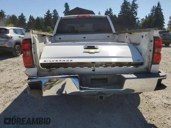 2016 Chevrolet Silverado 1500 LT with VIN 1GCUKREC9GF216617, listed as a Copart auction lot 64217675 with 187,486 mi miles and Salvage title. Bid and sale history available at DreamBid. Image 6.