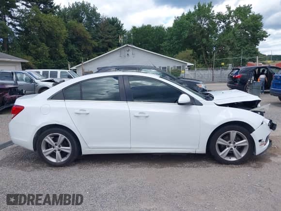 2013 Chevrolet Cruze 2LT z VIN 1G1PE5SB2D7138477, wystawiony jako IAAI lot #43074213 z przebiegiem 231 515 mil mil oraz . Historia ofert i sprzedaży dostępna na DreamBid. Obrazek 14.