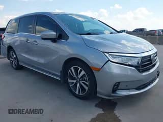 2023 Honda Odyssey Touring z VIN 5FNRL6H86PB037951, wystawiony jako IAAI lot #43345701 z przebiegiem 50 609 mil mil oraz . Historia ofert i sprzedaży dostępna na DreamBid. Obrazek 1.