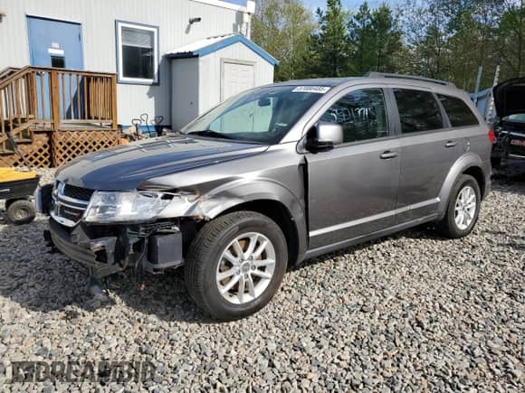 2013 Dodge Journey SXT with VIN 3C4PDCBB9DT722370, listed as a Copart auction lot 57086485 with 135,423 mi miles and Salvage title. Bid and sale history available at DreamBid. Image 1.