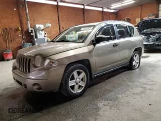 2007 Jeep Compass Sport with VIN 1J8FF47W77D180065, listed as a Copart auction lot 70202605 with 157,165 mi miles and Salvage title. Bid and sale history available at DreamBid. Image 1.