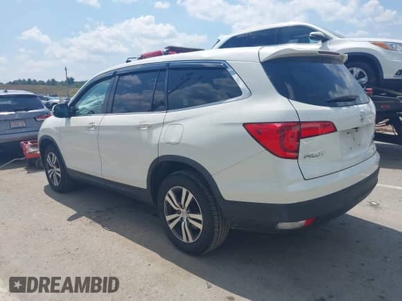 2017 Honda Pilot EX-L with VIN 5FNYF6H77HB017722, listed as a IAAI auction lot 42800151 with 94,457 mi miles and . Bid and sale history available at DreamBid. Image 3.