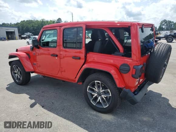 2024 Jeep Wrangler Sport S with VIN 1C4RJXN63RW321874, listed as a Copart auction lot 65197025 with 13,975 mi miles and Salvage title. Bid and sale history available at DreamBid. Image 2.