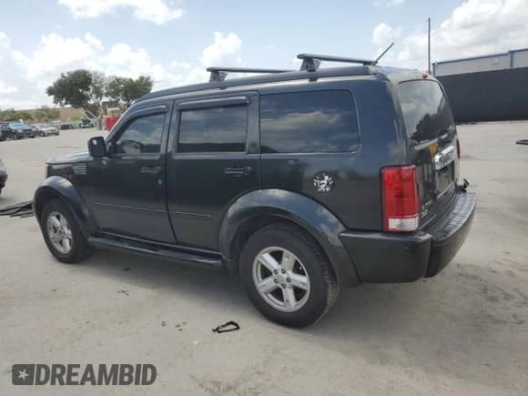 2007 Dodge Nitro SLT with VIN 1D8GT58K77W561510, listed as a Copart auction lot 60781755 with 159,445 mi miles and Salvage title. Bid and sale history available at DreamBid. Image 2.