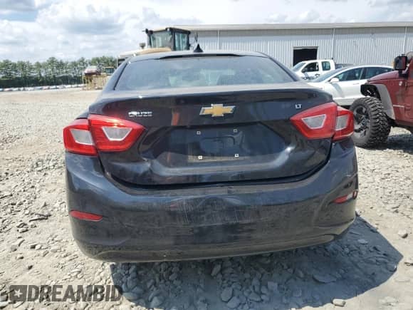 2018 Chevrolet Cruze LT с VIN 1G1BE5SMXJ7192407, выставлен на аукционе Copart как лот 68249915 с пробегом 97 087 миль миль и Списание • Salvage title. История ставок и продаж доступна на DreamBid. Изображение 6.