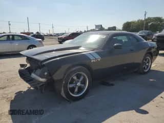 2010 Dodge Challenger R/T with VIN 2B3CJ5DT9AH147895, listed as a Copart auction lot 84658335 with 130,767 mi miles and Salvage title. Bid and sale history available at DreamBid. Image 1.