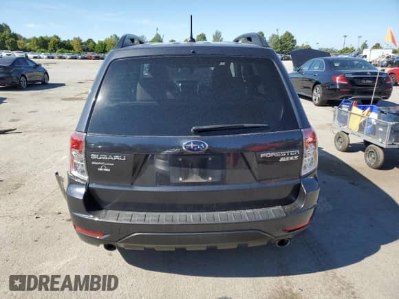 2013 Subaru Forester X Premium z VIN JF2SHADC9DH410591, wystawiony jako Copart lot #80875475 z przebiegiem 57 512 mil mil oraz Szkoda całkowita • Salvage title. Historia ofert i sprzedaży dostępna na DreamBid. Obrazek 6.