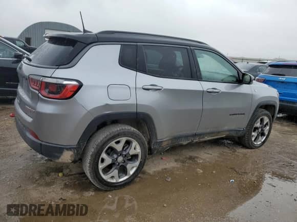 2019 Jeep Compass Trailhawk with VIN 3C4NJDDB7KT671080, listed as a Copart auction lot 60645655 with 131,581 mi miles and Salvage title. Bid and sale history available at DreamBid. Image 3.