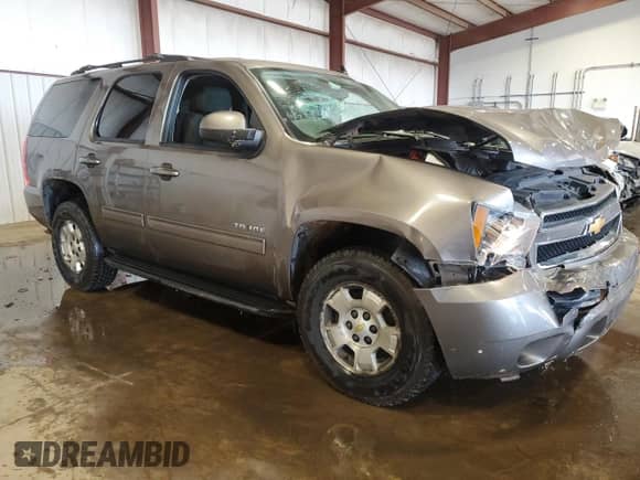 2012 Chevrolet Tahoe LS with VIN 1GNSKAE06CR227928, listed as a Copart auction lot 65878915 with 117,985 mi miles and Salvage title. Bid and sale history available at DreamBid. Image 4.