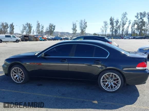 2004 BMW 7 Series 745i with VIN WBAGL63494DP70233, listed as a IAAI auction lot 41622647 with 135,239 mi miles and . Bid and sale history available at DreamBid. Image 14.