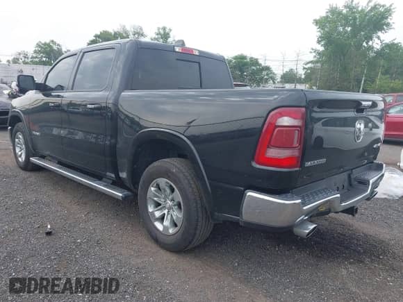 2021 Ram 1500 Laramie z VIN 1C6SRFJT1MN774221, wystawiony jako IAAI lot #42505708 z przebiegiem 48 645 mil mil oraz . Historia ofert i sprzedaży dostępna na DreamBid. Obrazek 3.