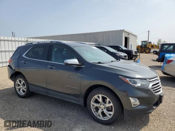 2019 Chevrolet Equinox Premier с VIN 3GNAXXEV4KS649364, выставлен на аукционе Copart как лот 80106345 с пробегом 71 722 миль миль и Списание • Salvage title. История ставок и продаж доступна на DreamBid. Изображение 4.