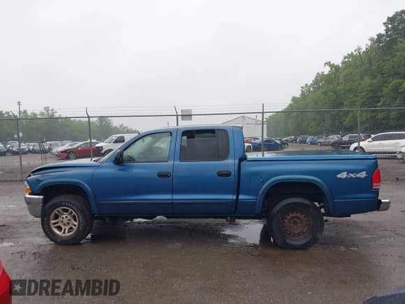 2003 Dodge Dakota SLT with VIN 1D7HG48N63S350401, listed as a IAAI auction lot 42503078 with 199,341 mi miles and . Bid and sale history available at DreamBid. Image 14.